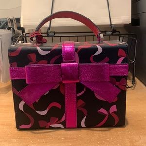 Never used Kate Spade wrapping party purse